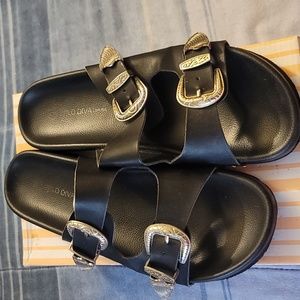 Used  strapped sandals